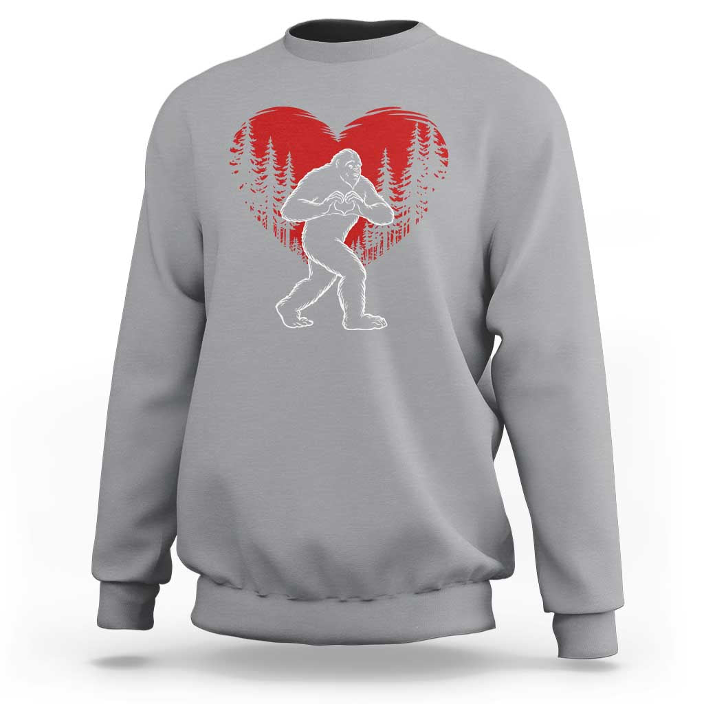 Funny Valentine Bigfoot in Love Heart Hand Sign Sweatshirt Romantic Sasquatch in Forest Valentines Day