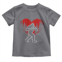 Funny Valentine Bigfoot in Love Heart Hand Sign Toddler T Shirt Romantic Sasquatch in Forest Valentines Day
