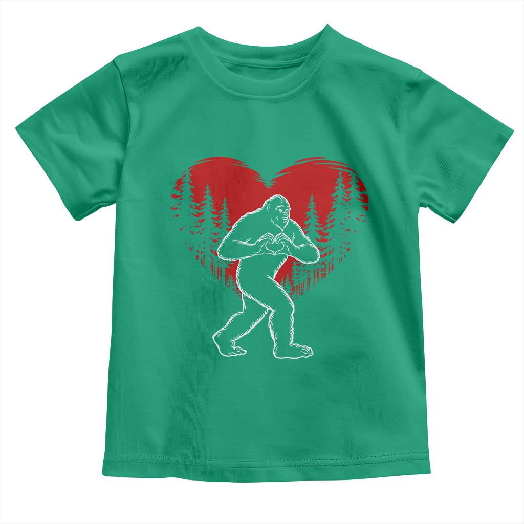 Funny Valentine Bigfoot in Love Heart Hand Sign Toddler T Shirt Romantic Sasquatch in Forest Valentines Day