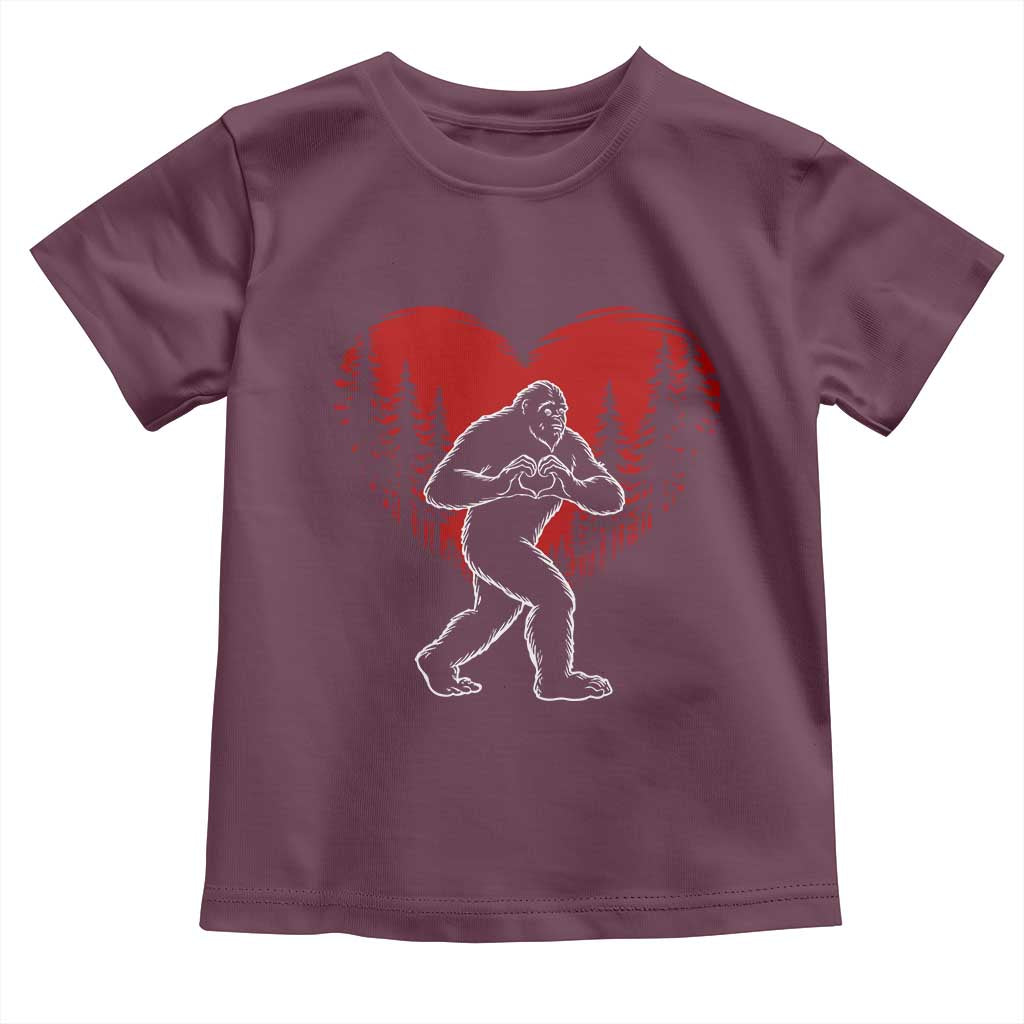 Funny Valentine Bigfoot in Love Heart Hand Sign Toddler T Shirt Romantic Sasquatch in Forest Valentines Day