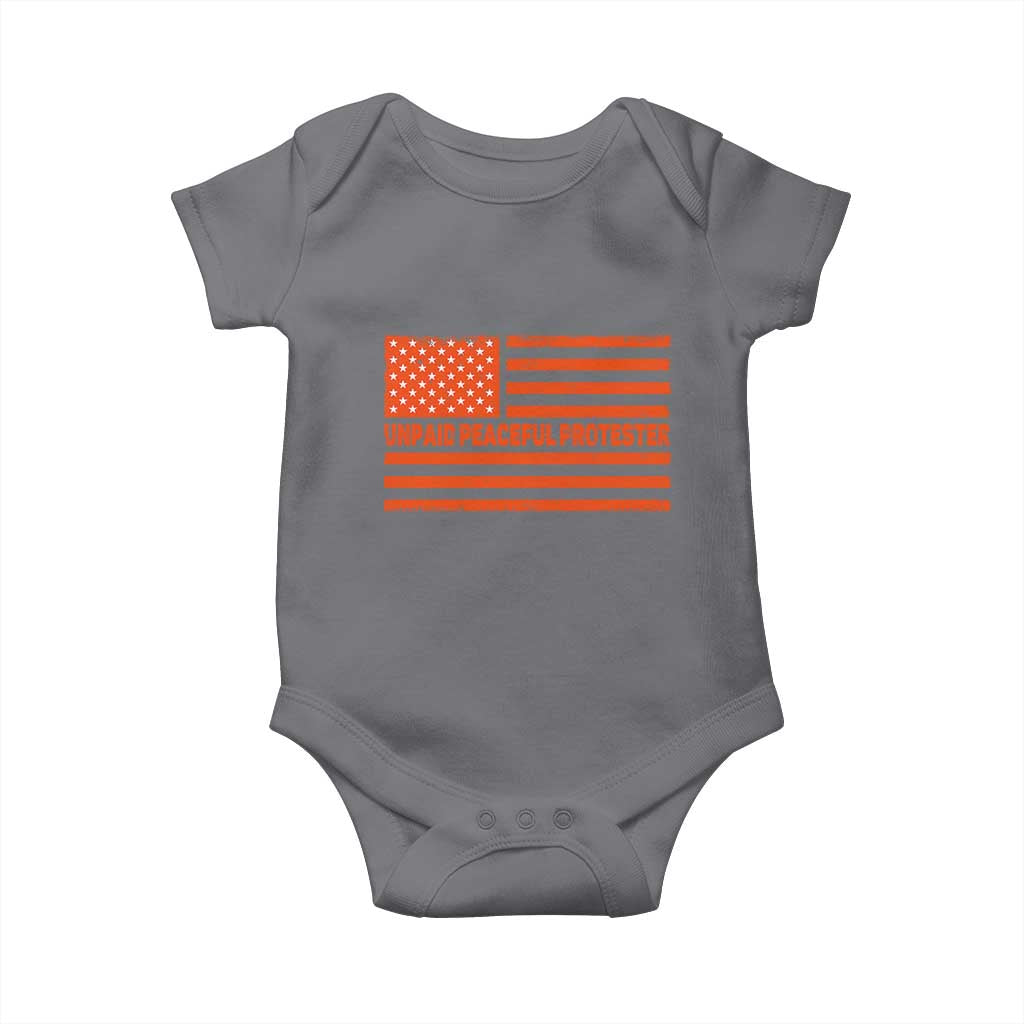 Unpaid Peaceful Protester Orange Distressed American Flag Baby Onesie Satirical Political Graphic