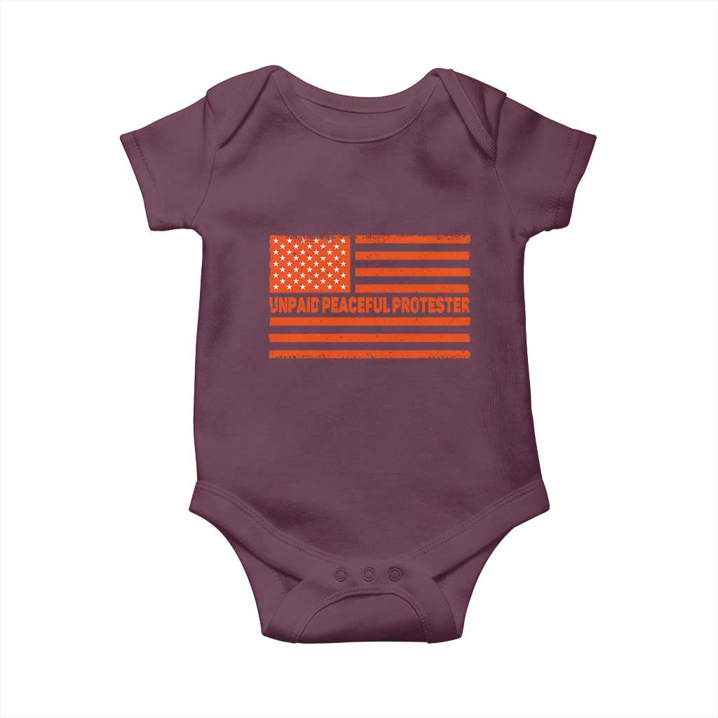 Unpaid Peaceful Protester Orange Distressed American Flag Baby Onesie Satirical Political Graphic
