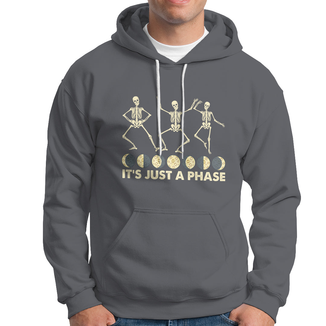 Charcoal gray hoodie with moon-phase skeleton dancers graphic and 'It's Just A Phase' text