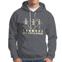 Charcoal gray hoodie with moon-phase skeleton dancers graphic and 'It's Just A Phase' text