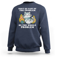 Navy crewneck sweatshirt with cat graphic and 'BE THE WHOLE PROBLEM' text