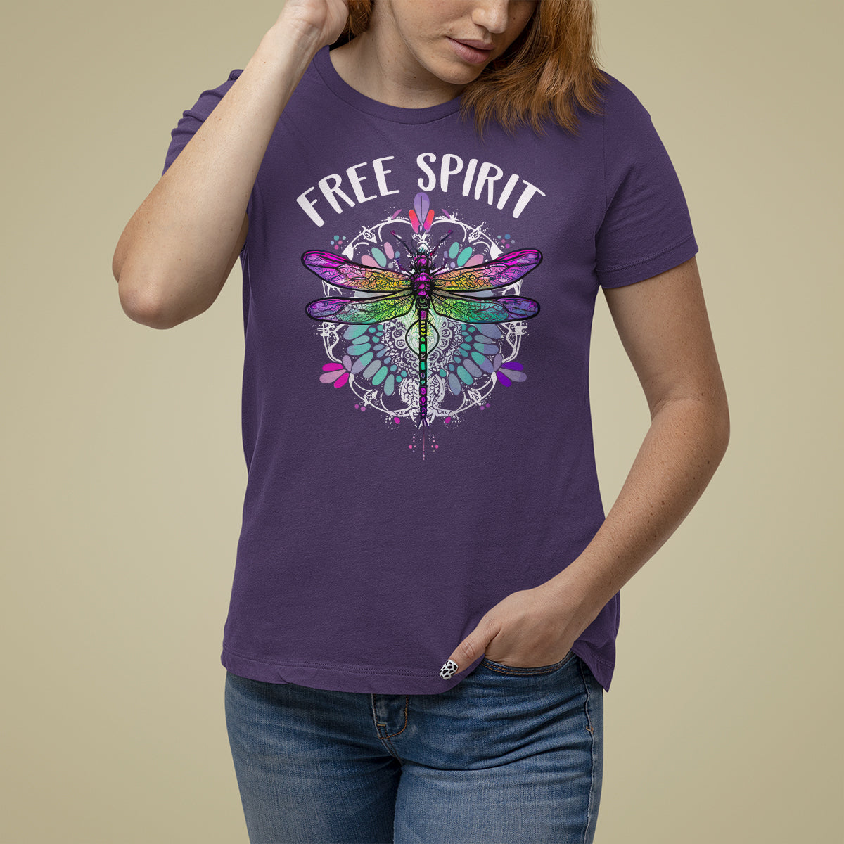 Women’s purple dragonfly graphic t-shirt with “FREE SPIRIT” text front.