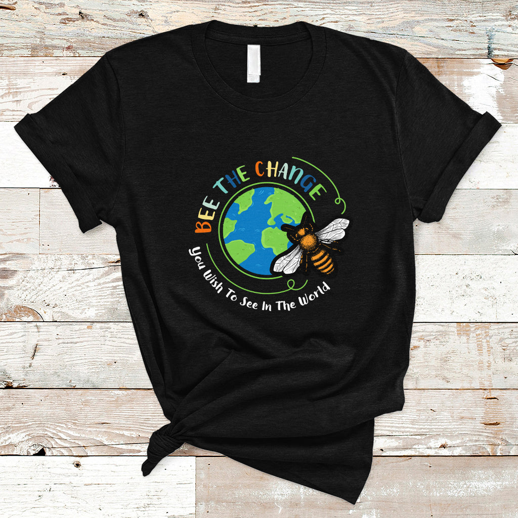 Black T-shirt with circular bee and globe graphic and slogan