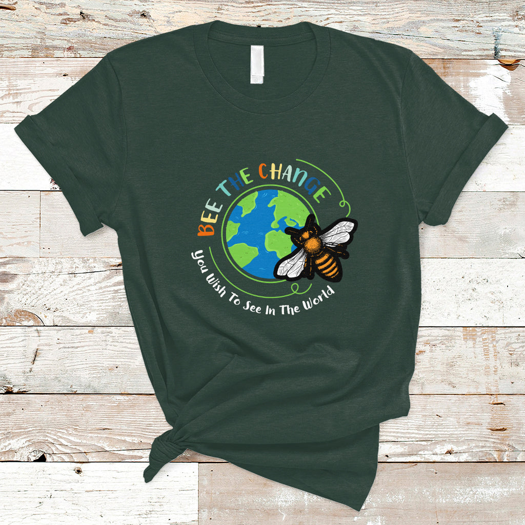 Dark forest green T-shirt with circular bee and globe graphic and slogan