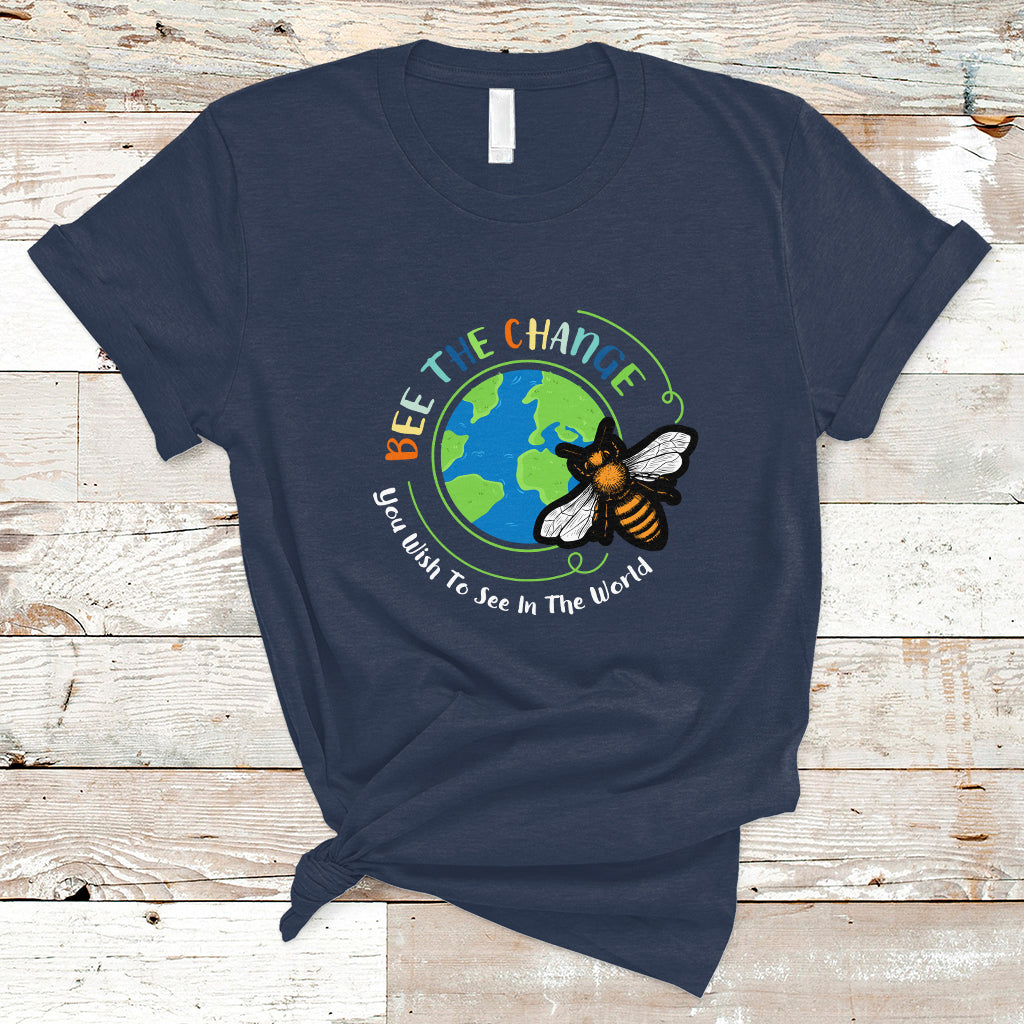 Navy T-shirt with circular bee and globe graphic and slogan