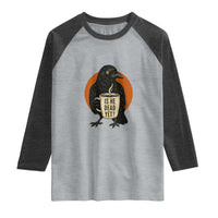 Is He Dead Yet Crow Holding Coffee Cup Raglan Shirt Funny Dark Humor Political Satire