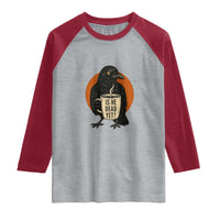 Is He Dead Yet Crow Holding Coffee Cup Raglan Shirt Funny Dark Humor Political Satire