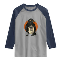 Is He Dead Yet Crow Holding Coffee Cup Raglan Shirt Funny Dark Humor Political Satire