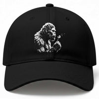 Bigfoot Blowing Dandelion Flower Graphic Baseball Cap Whimsical Sasquatch Profile Artistic Vintage Distressed