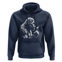 Bigfoot Blowing Dandelion Flower Graphic Hoodie Whimsical Sasquatch Profile Artistic Vintage Distressed