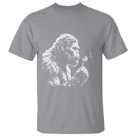 Bigfoot Blowing Dandelion Flower Graphic T Shirt Whimsical Sasquatch Profile Artistic Vintage Distressed