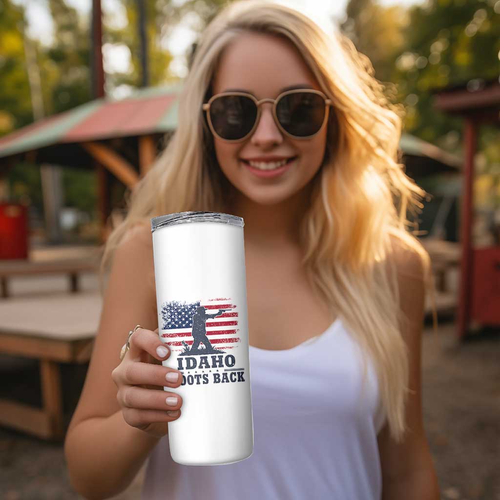 Idaho Shoots Back Distressed American Flag Skinny Tumbler Cowboy Gunslinger Graphic