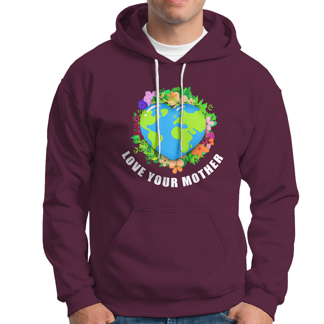 Maroon pullover hoodie with colorful heart Earth graphic and kangaroo pocket.