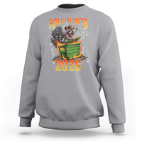 Dumpster Fire Raccoon Meme for Surviving 2025 Sweatshirt Rollin Into 2026 Trash Panda Energy - Wonder Print Shop