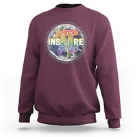 Maroon crewneck sweatshirt with colorful math symbol graphic on chest