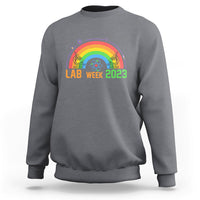 Crewneck lab sweatshirt in charcoal gray with Lab Week 2023 rainbow graphic