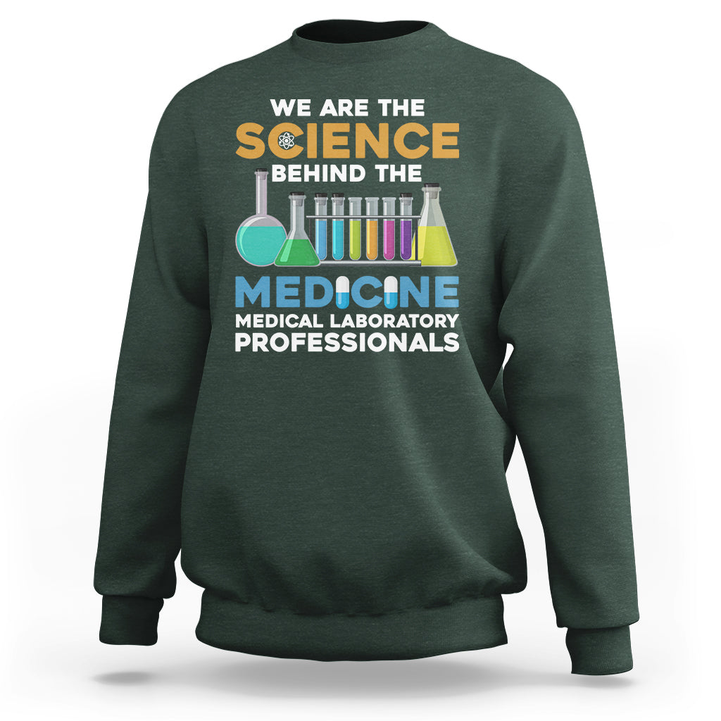 Dark forest green medical lab tech sweatshirt with colorful science and medicine graphic