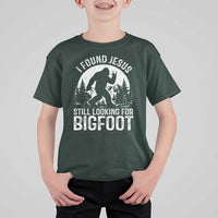 Funny Christian Sasquatch T Shirt For Kid I Found Jesus Still Looking for Bigfoot Vintage Distressed Graphic