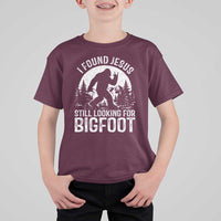 Funny Christian Sasquatch T Shirt For Kid I Found Jesus Still Looking for Bigfoot Vintage Distressed Graphic