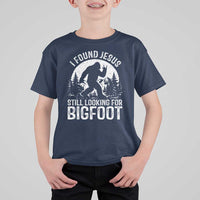 Funny Christian Sasquatch T Shirt For Kid I Found Jesus Still Looking for Bigfoot Vintage Distressed Graphic