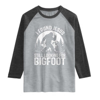 Funny Christian Sasquatch Raglan Shirt I Found Jesus Still Looking for Bigfoot Vintage Distressed Graphic