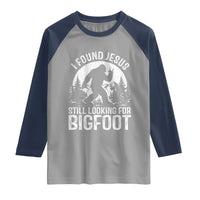 Funny Christian Sasquatch Raglan Shirt I Found Jesus Still Looking for Bigfoot Vintage Distressed Graphic