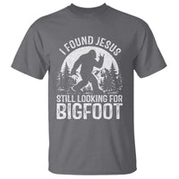 Funny Christian Sasquatch T Shirt I Found Jesus Still Looking for Bigfoot Vintage Distressed Graphic