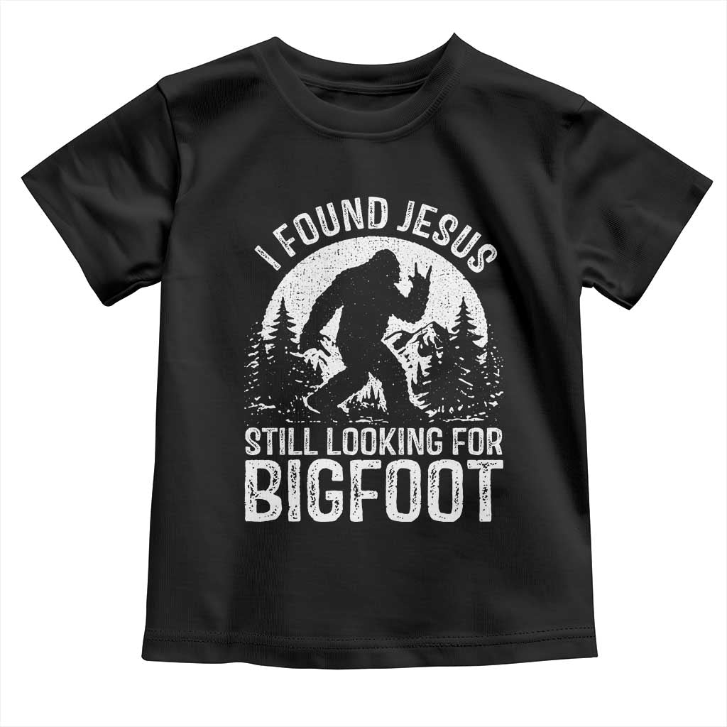 Funny Christian Sasquatch Toddler T Shirt I Found Jesus Still Looking for Bigfoot Vintage Distressed Graphic
