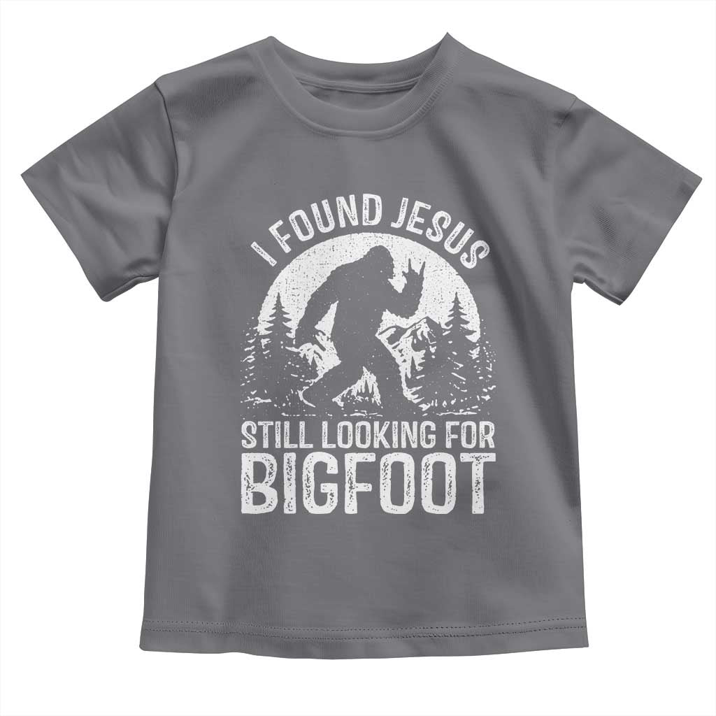 Funny Christian Sasquatch Toddler T Shirt I Found Jesus Still Looking for Bigfoot Vintage Distressed Graphic