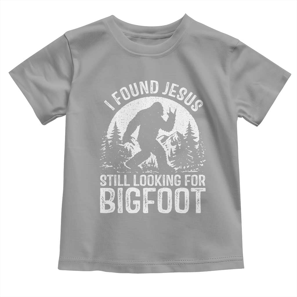Funny Christian Sasquatch Toddler T Shirt I Found Jesus Still Looking for Bigfoot Vintage Distressed Graphic