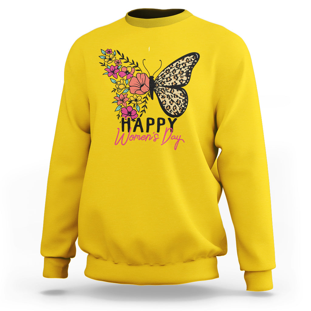 Daisy yellow women's crewneck sweatshirt with butterfly and floral 'Happy Women's Day' print.