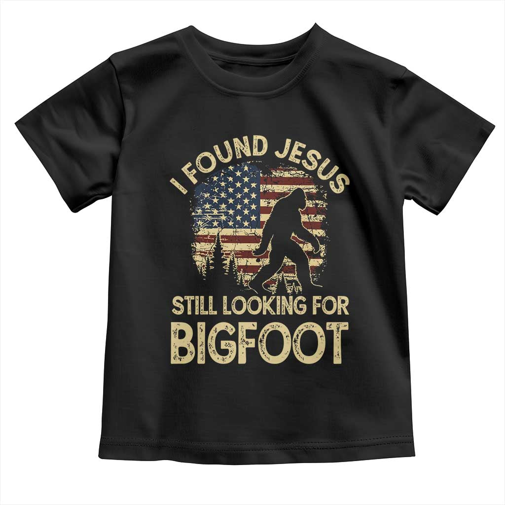 I Found Jesus Still Looking for Bigfoot Patriotic Toddler T Shirt American Flag Christian Religious Sasquatch Vintage