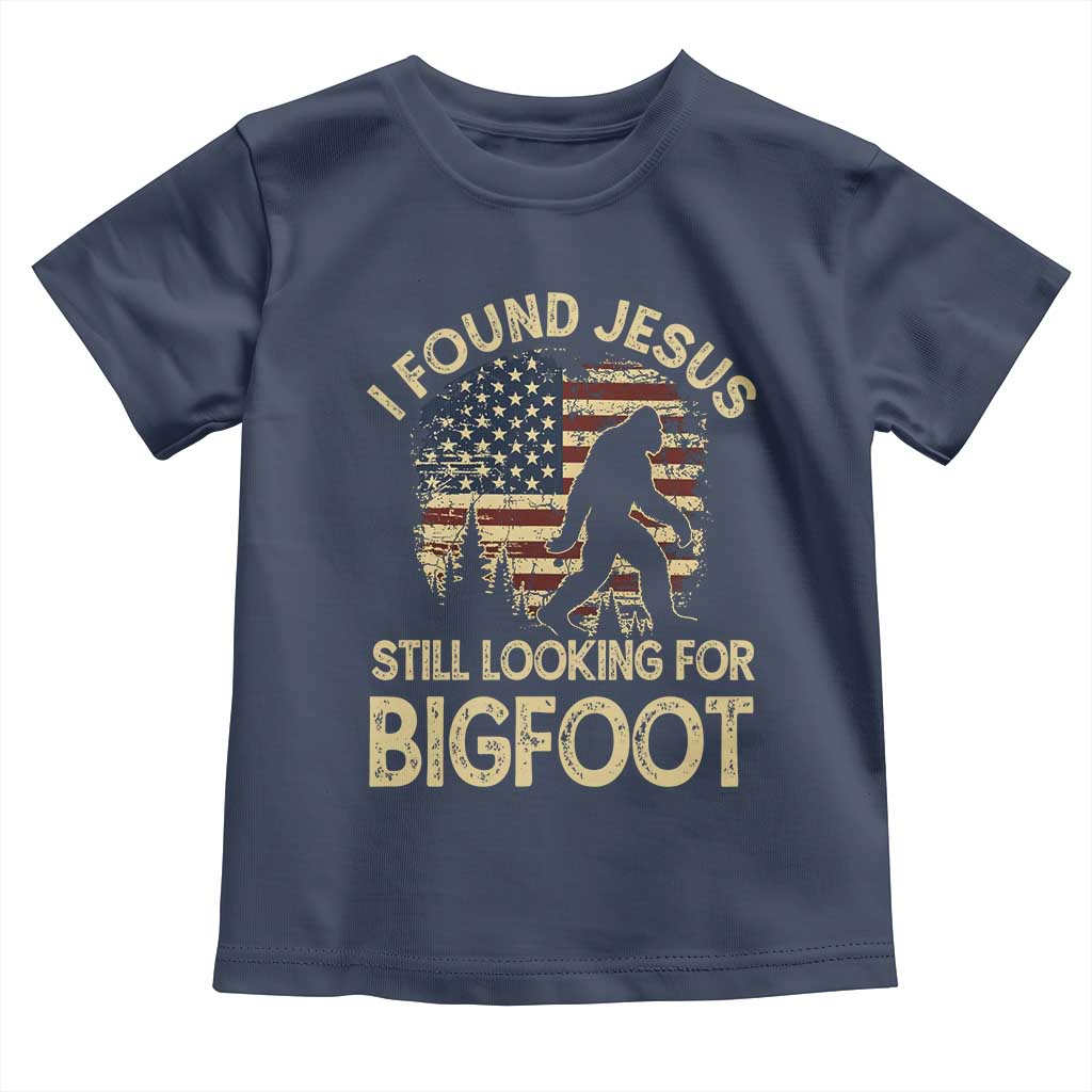 I Found Jesus Still Looking for Bigfoot Patriotic Toddler T Shirt American Flag Christian Religious Sasquatch Vintage