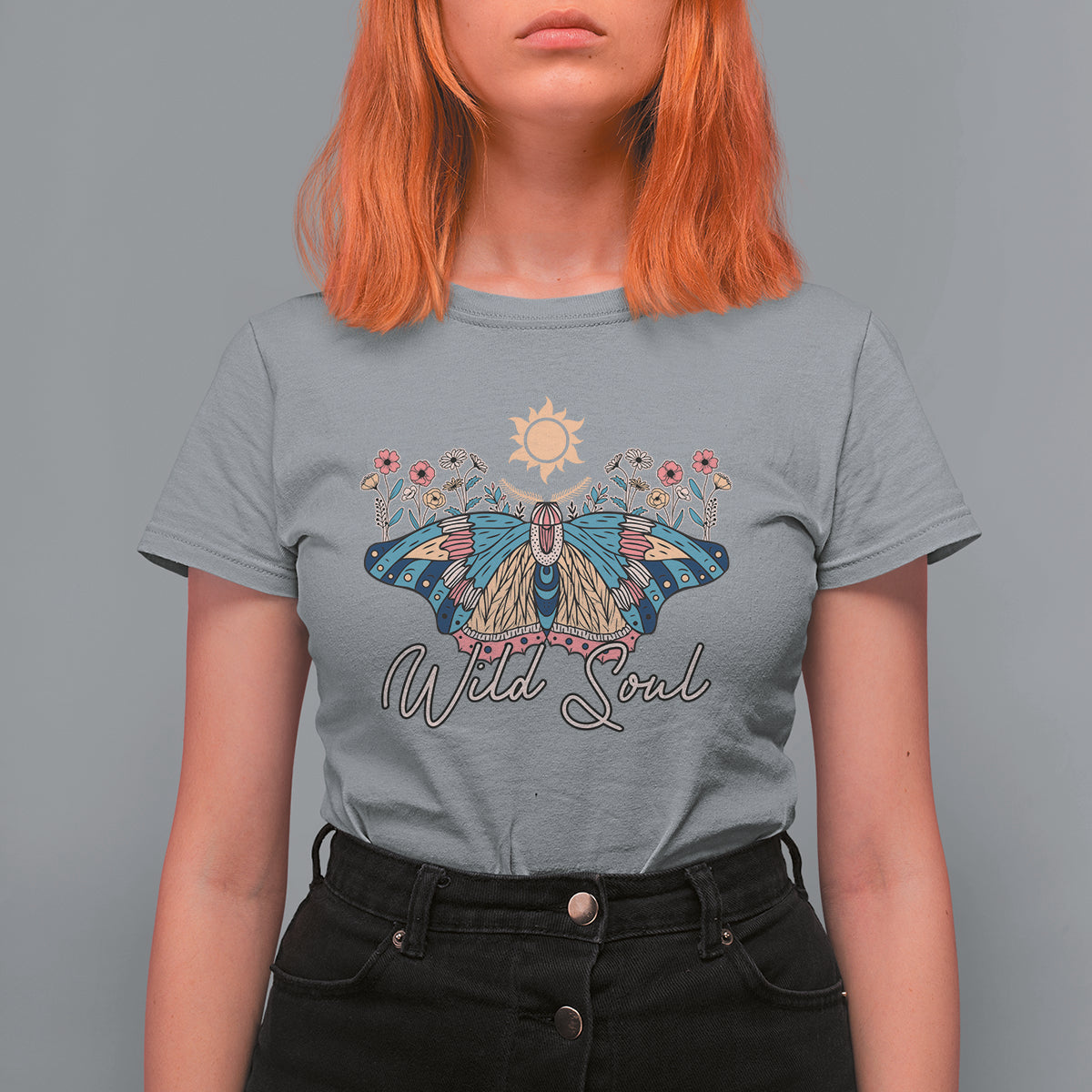 Women's gray graphic t-shirt with colorful moth, sun, and 'Wild Soul' print