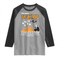 WKRP Turkey Drop with Les Nessman Raglan Shirt Retro Thanksgiving Humor for Classic TV Fans - Wonder Print Shop