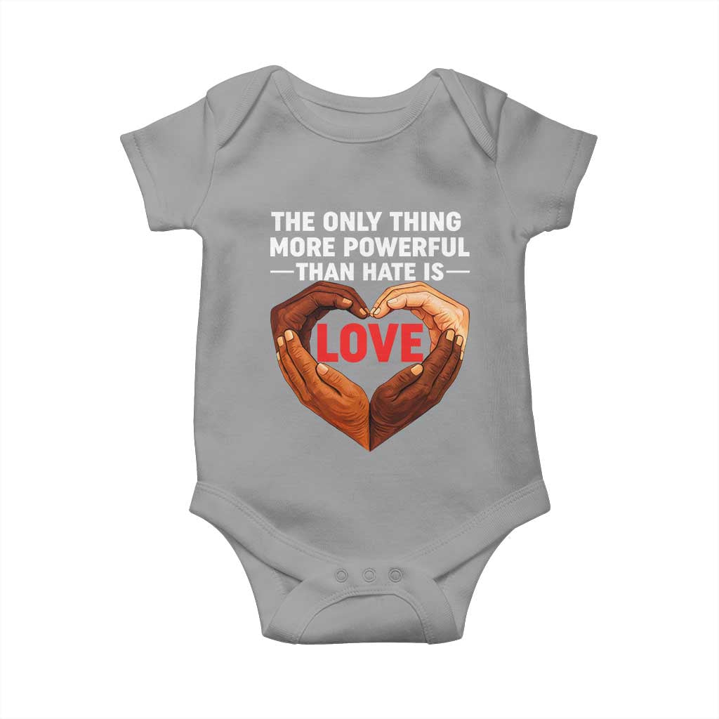 The Only Thing More Powerful Than Hate Is Love Baby Onesie Heart in Hands Unity Bunny Inspirational Quote