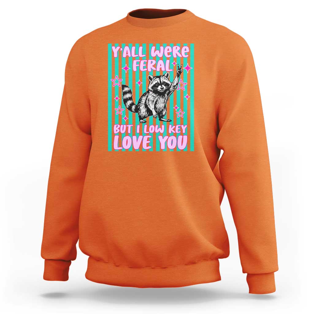 Y'all Were Feral But I Low Key Love You Pink Stripes Raccoon Sweatshirt Funny Teacher End of Yea