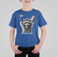 Funny America Raccoon Happy 4th of July T Shirt For Kid Holding Hotdog and US Flag Patriotic Graphic