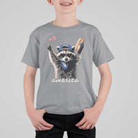 Funny America Raccoon Happy 4th of July T Shirt For Kid Holding Hotdog and US Flag Patriotic Graphic