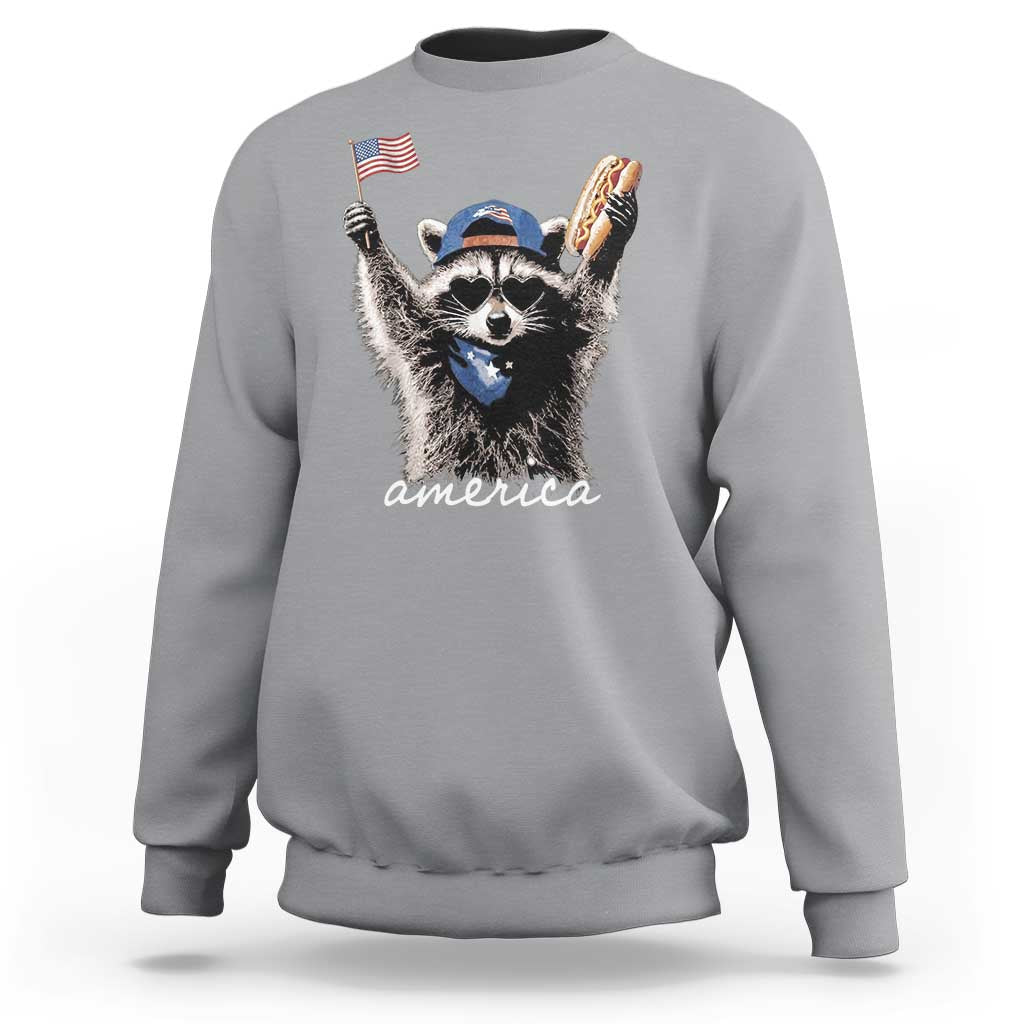 Funny America Raccoon Happy 4th of July Sweatshirt Holding Hotdog and US Flag Patriotic Graphic