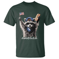 Funny America Raccoon Happy 4th of July T Shirt Holding Hotdog and US Flag Patriotic Graphic