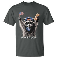 Funny America Raccoon Happy 4th of July T Shirt Holding Hotdog and US Flag Patriotic Graphic