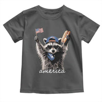 Funny America Raccoon Happy 4th of July Toddler T Shirt Holding Hotdog and US Flag Patriotic Graphic