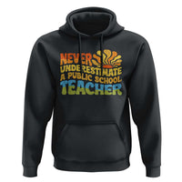 Never Underestimate A Public School Teacher Hoodie Tim Walz 2024 Saying Public Education - Wonder Print Shop