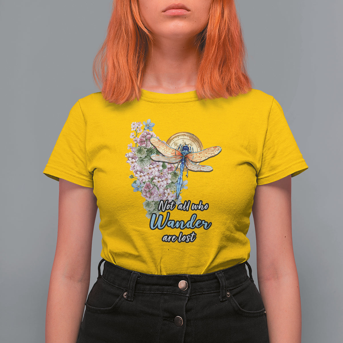 Women’s daisy yellow T-shirt with dragonfly and pink floral “Not all who Wander are lost” print