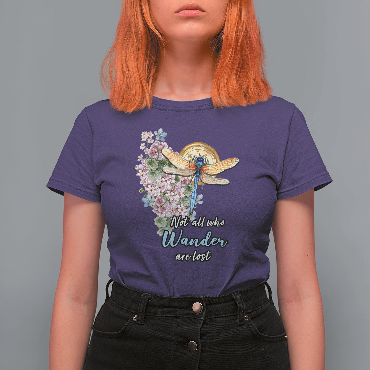 Women’s purple T-shirt with dragonfly and pink floral “Not all who Wander are lost” print